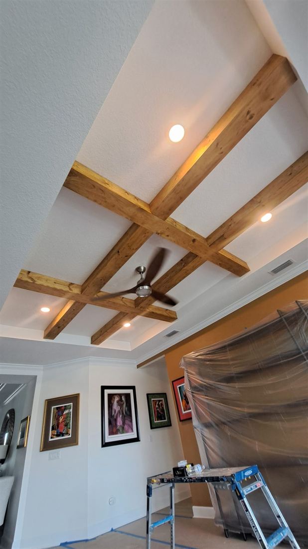 Coffered ceiling with natural wood beams